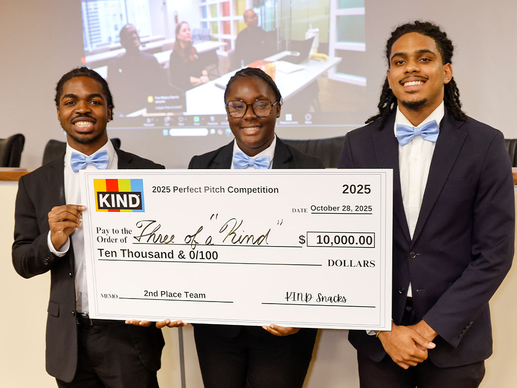 Team “Three of a Kind” celebrates their $10,000 second-place win at the 2025 KIND Perfect Pitch Competition.