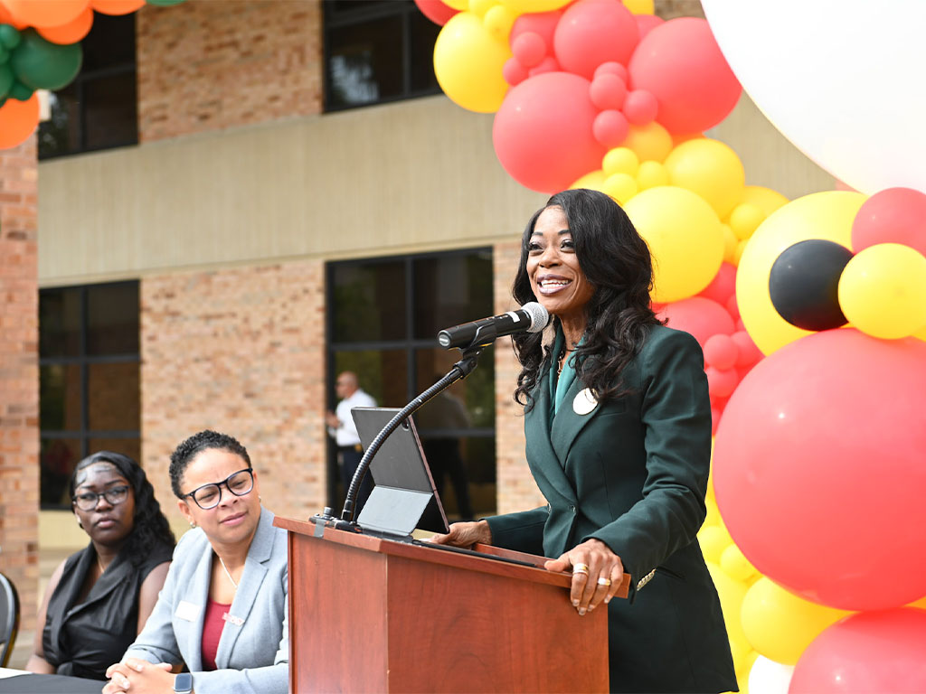 Florida A&M University President Marva B. Johnson, J.D., delivers remarks during the signing ceremony.