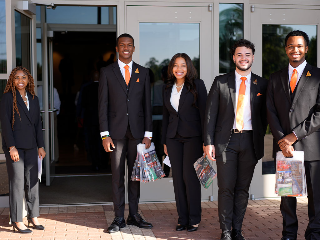 Florida A&M University student leaders pose during a recruitment event, representing the University and helping prospective Rattlers envision their future through student leadership, academic opportunities and campus involvement.