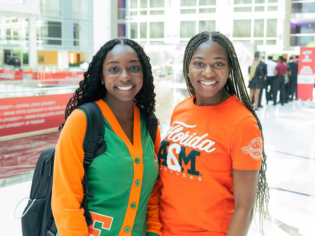 Two Florida A&M University students proudly represent the Rattlers while attending a 2026 Thurgood Marshall College Fund event, which provides opportunities for professional development, networking and career exploration.