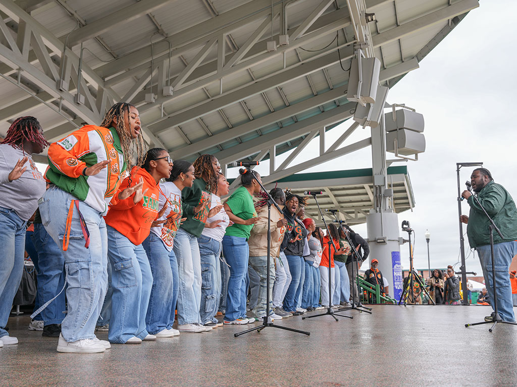 The Florida A&M University Gospel Choir delivers a powerful performance during the Harambee Festival, filling the Will Packer Amphitheater with energy, unity and soulful expression.