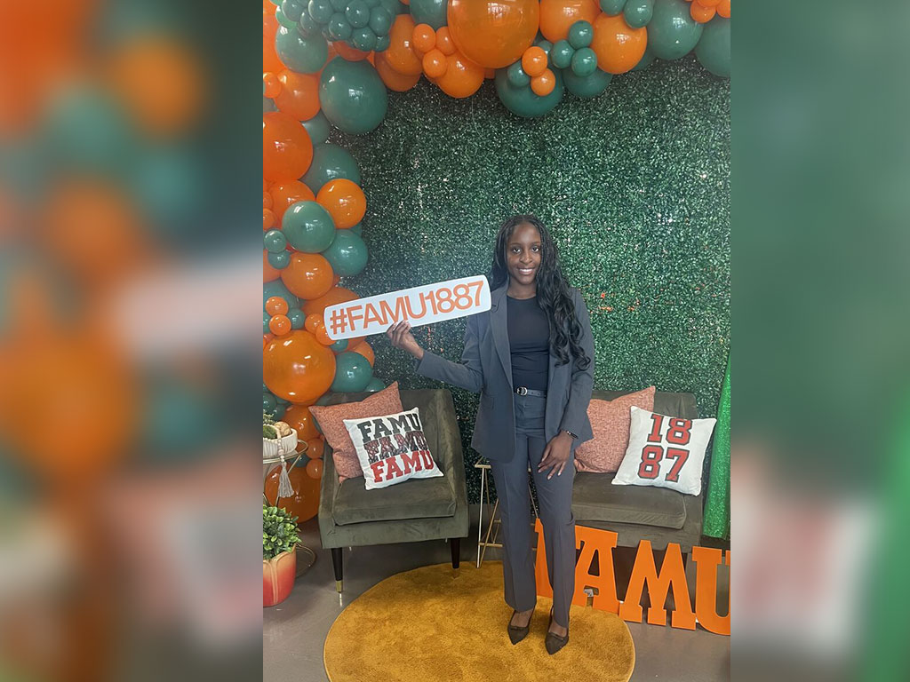 Katiana Pierre, a fourth-year business administration scholar from Miami, proudly displays her Rattler pride while attending the Thurgood Marshall College Fund Leadership Institute. Pierre was among 500 students selected from approximately 3,000 applicants to participate in the professional development experience.