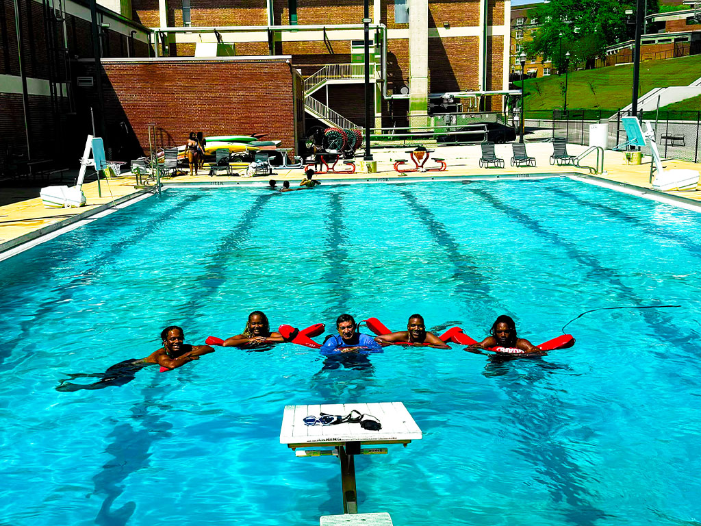 Group photo of FAMU Aquatics Program participants in the FAMU pool