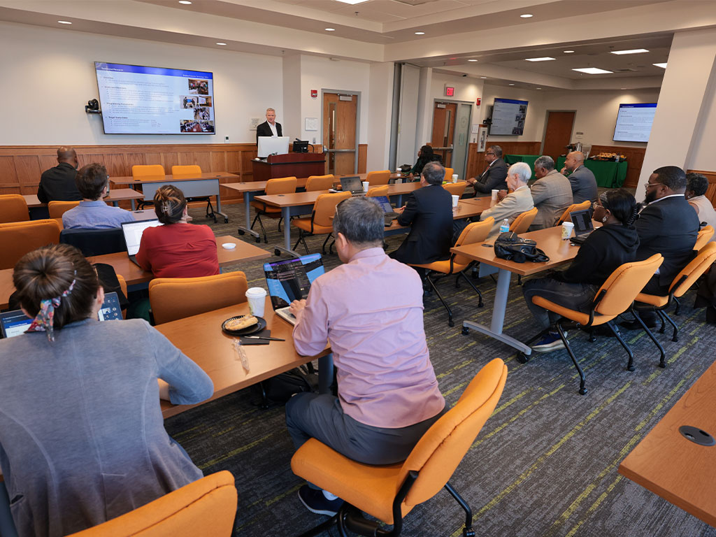 Staff and faculty gather for more information on BOEING