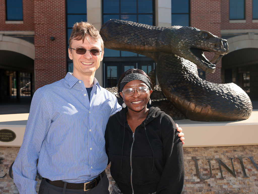 Destiny Law and her professor pose for a picture 