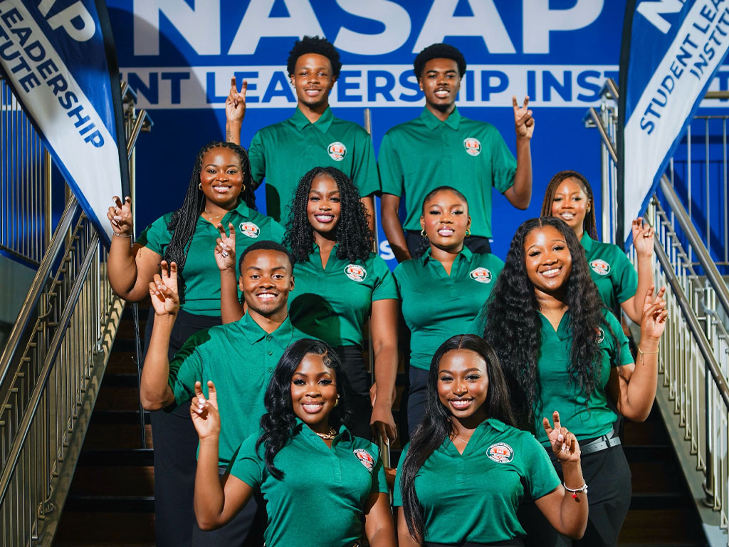 FAMU student leaders pose with their rattler strike at 2025 NASAP conference