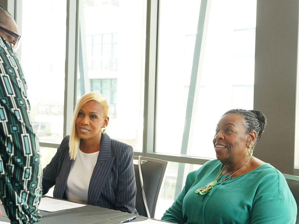 Two women at Big Bend Small Business Week sitting at the table