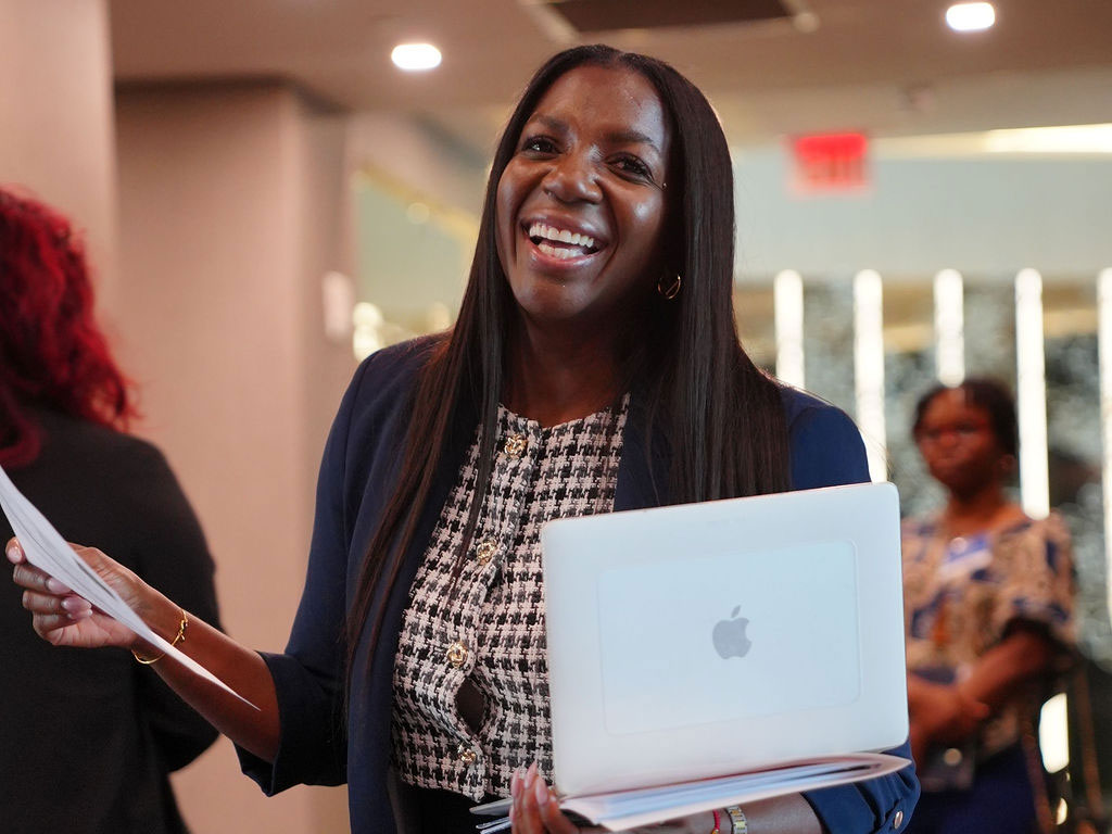 Tangela Lofton with mac book in hand at Big Bend