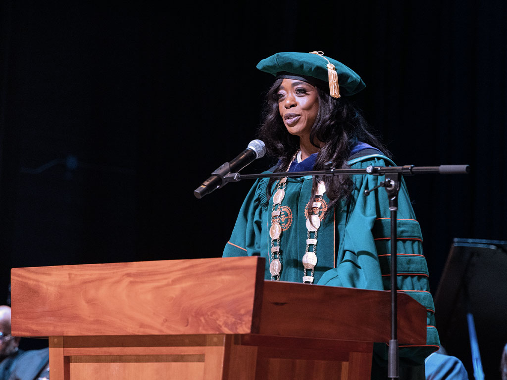 President Marva Johnson J.D. giving remarks at Dr. Bryant's service