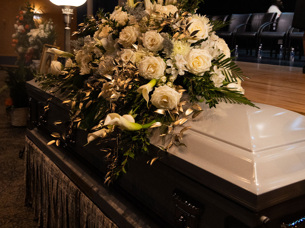A beautiful casket for Dr. Castell Bryant