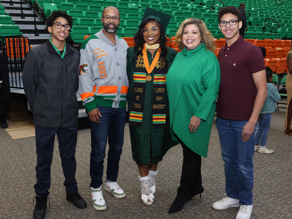 As a second generation FAMUan, Celeste Harper (center) charted her own path during her time at Florida A&M University and achieved a bachelor’s degree in agricultural science. Pictured L-R: Brother Prescott, Father Andre, Celeste, Mother Kristin and Brother Montgomery.