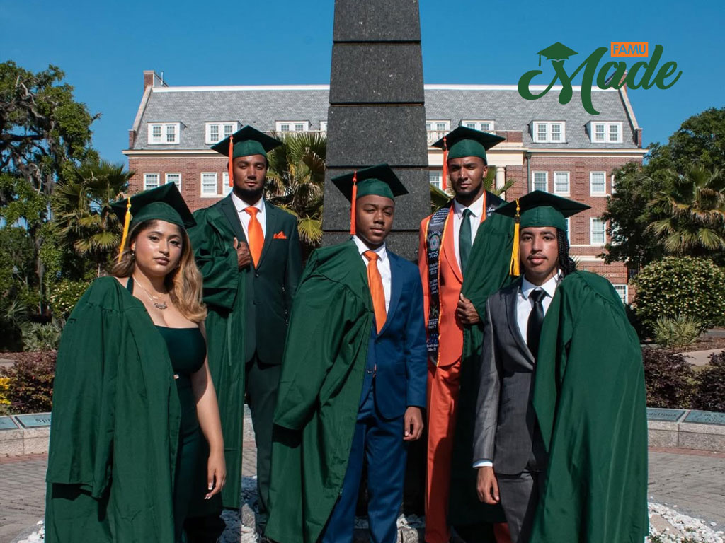 Group shot of Curtis Lawrence and other spring graduates