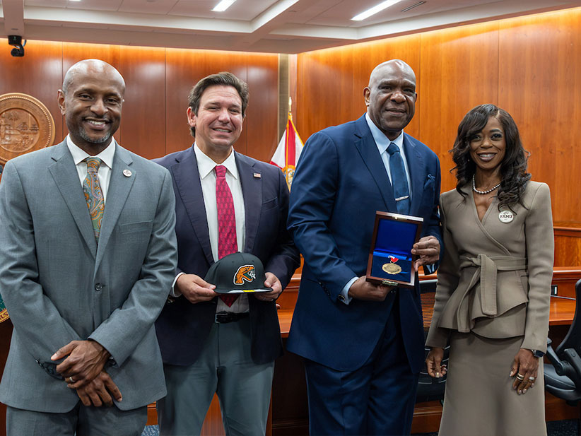 Andre Dawson, Trustee Harris, President Johnson and Governor DeSantis