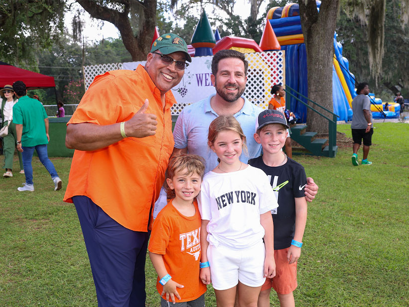 Dean Wesson with a family of Grape Harvest Festival guest.