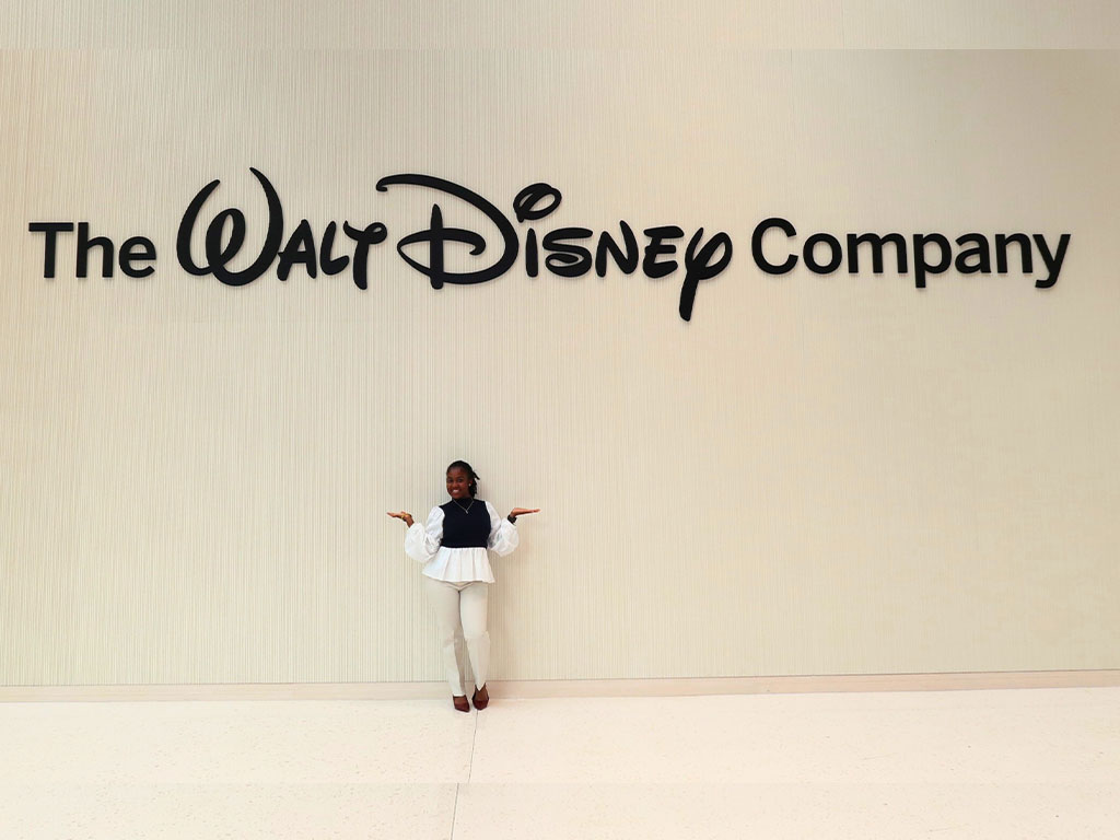 Kennedy Richardson Underneath The Walt Disney Company Sign