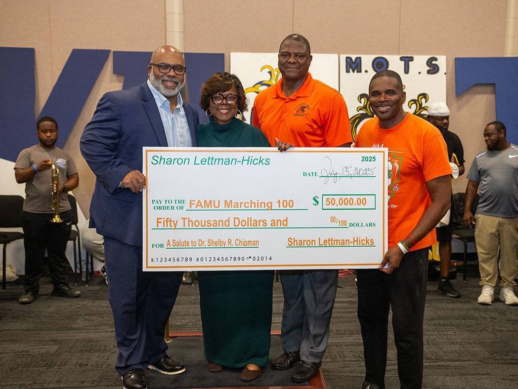 Dr. Shelby Chipman, Sharon Lettman-Hicks, Marvin Green Jr. and Vice President of Advancement Dr. Anthony Neal