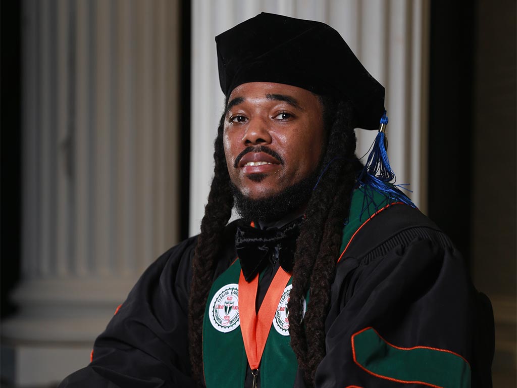 Headshot of Dr.Johnson upon graduation. 