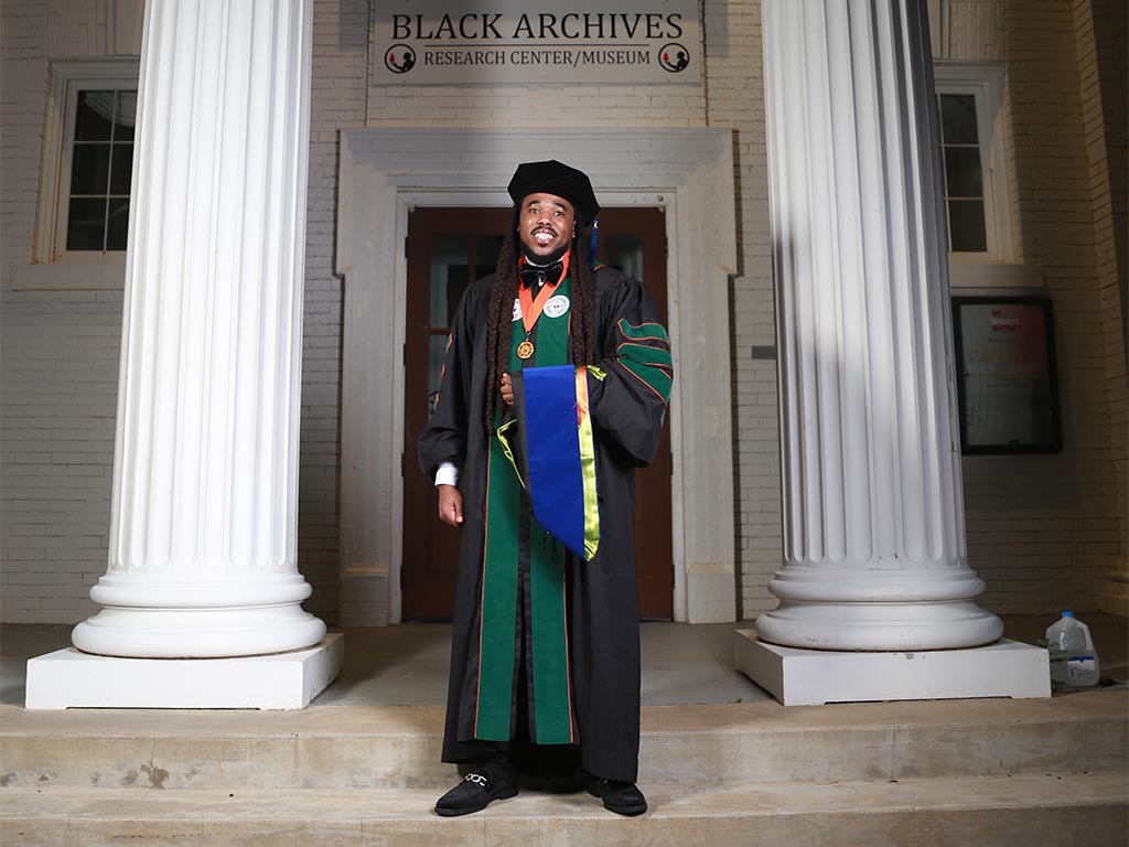 Dr. Johnson in front of FAMU’s Black Archives — where culture and history live on