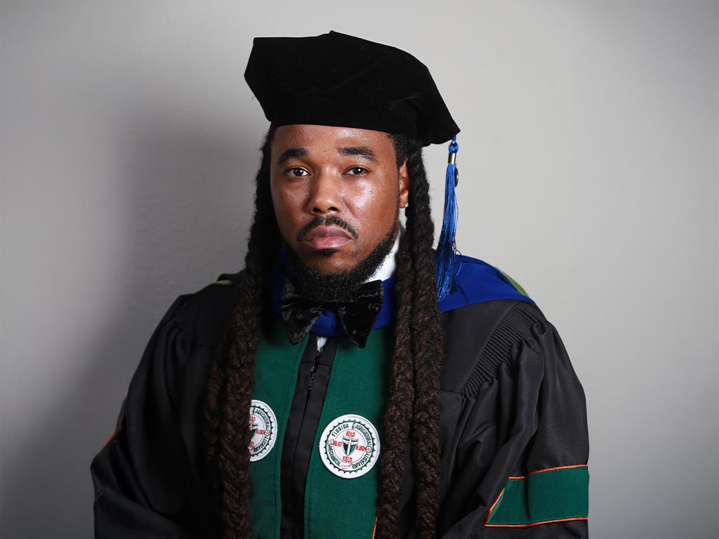 Maurice Johnson takes it all in — officially a Doctor