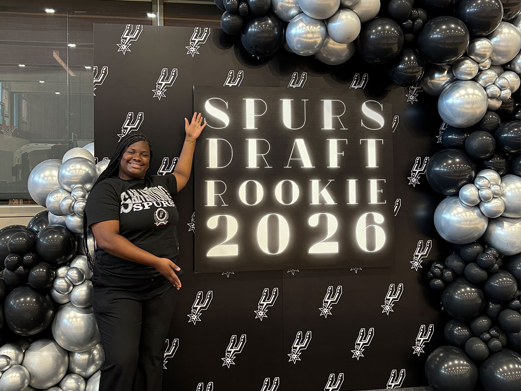 FAMU School of Business and Industry student Faith Paul poses at the San Antonio Spurs Draft Rookie 2026 event during her summer experience as an NBA HBCU Fellow with the organization.