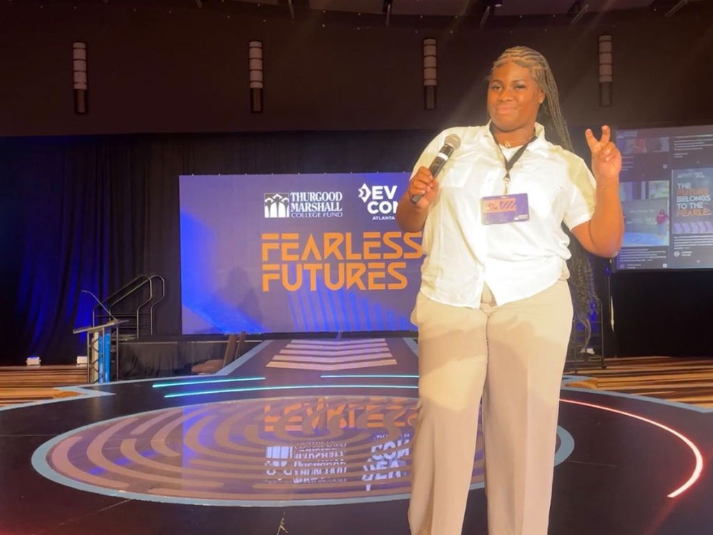 Paul takes the stage during the Thurgood Marshall College Fund’s Fearless Futures event, one of several professional development experiences that helped her strengthen her confidence, leadership skills and industry network. Photo Courtesy: Faith Paul