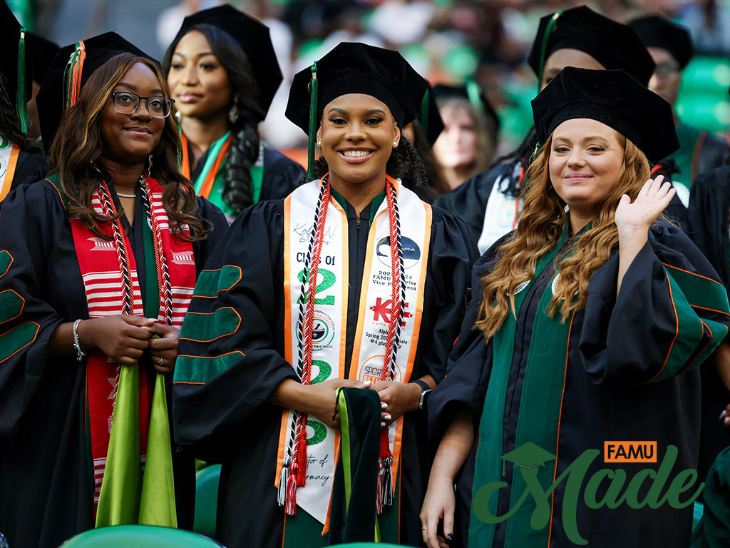 FAMU Girl Grads smiling at the camera