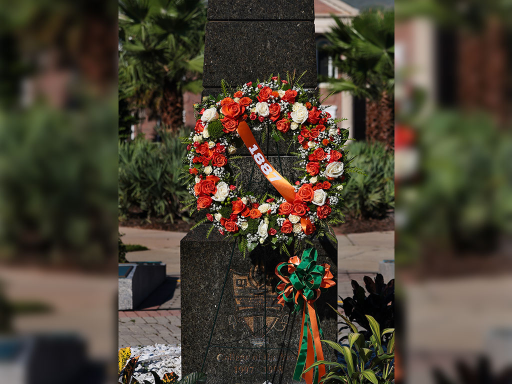 Eternal flame with Founder's day wreath in organe and green