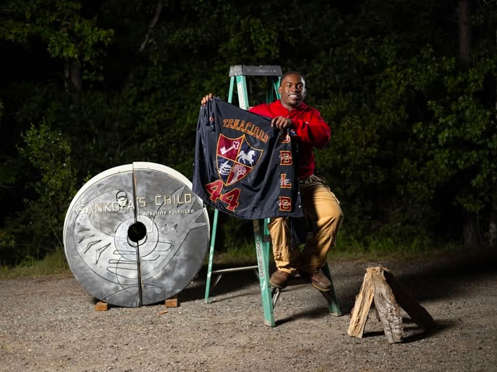 Mark Futch, a Florida A&M University cardiopulmonary science graduate, poses with memorabilia representing his journey as a Rattler. During his time on The Hill, Futch embraced opportunities to grow personally and professionally, preparing him for a career in respiratory therapy. (Photo courtesy of Mark Futch.)