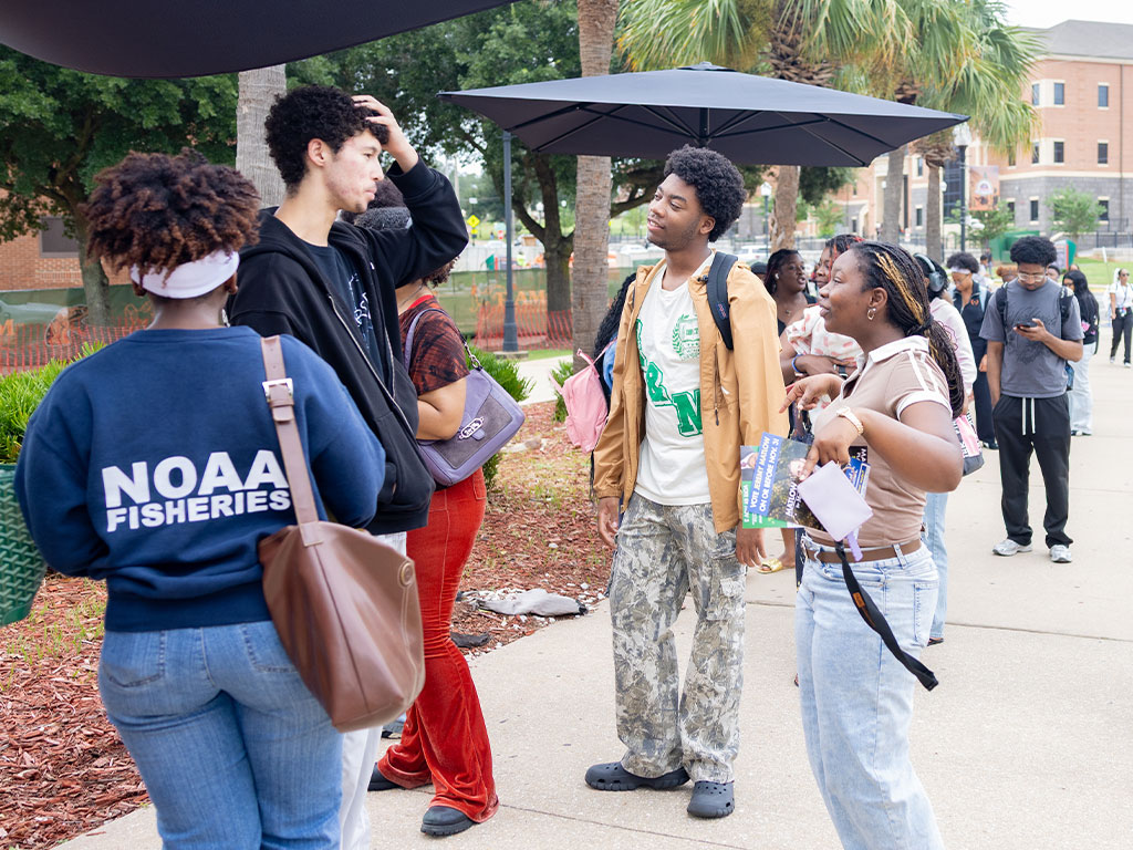 Florida A&M University students engage in conversation outside the Google HBCU RISE Summit on Oct. 8. The event introduced students to emerging artificial intelligence technologies and opportunities to develop skills for academic and professional success.