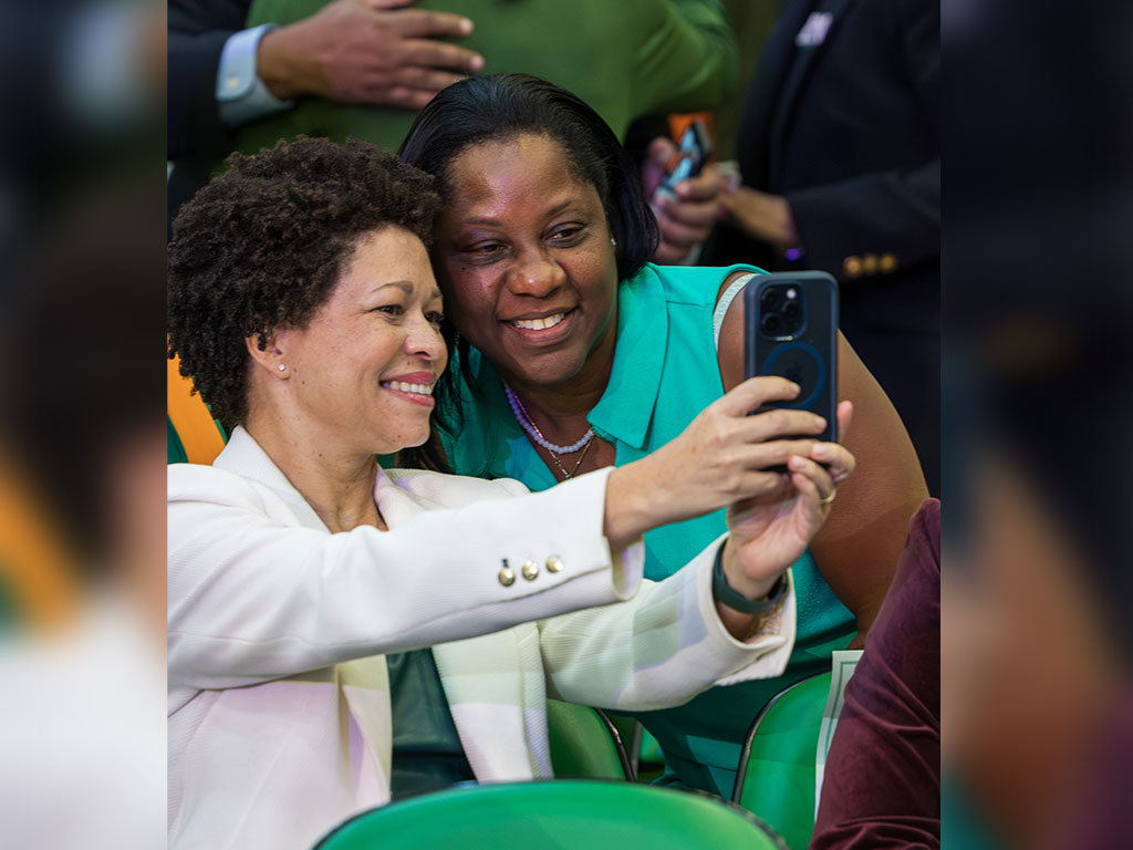 FAMU attendees capture a special moment during the university's 2026 Homecoming Convocation, celebrating the connections and traditions that unite the Rattler community. (Photo by Jeff Adams/FAMU)