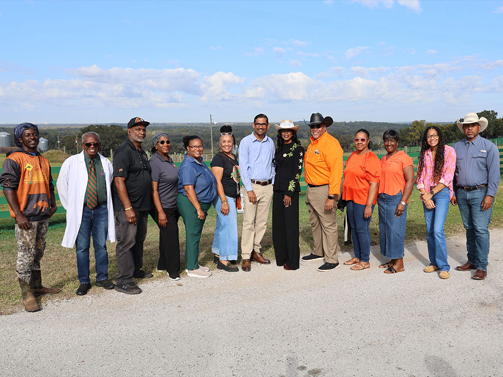 President Marva Johnson pictured with the BAERS Faculty and Staff.