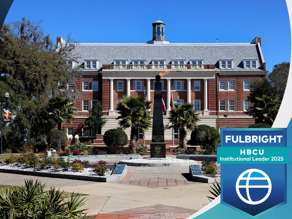 Lee Hall and the eternal flame with the Fulbright HBCU Institutional Leader 2025 Badge Frame