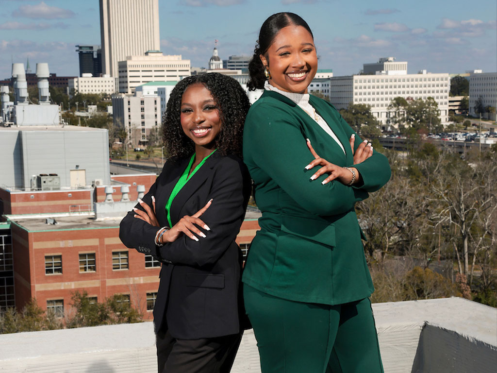 Zayla Bryant and Kennedy Williams posed back to back