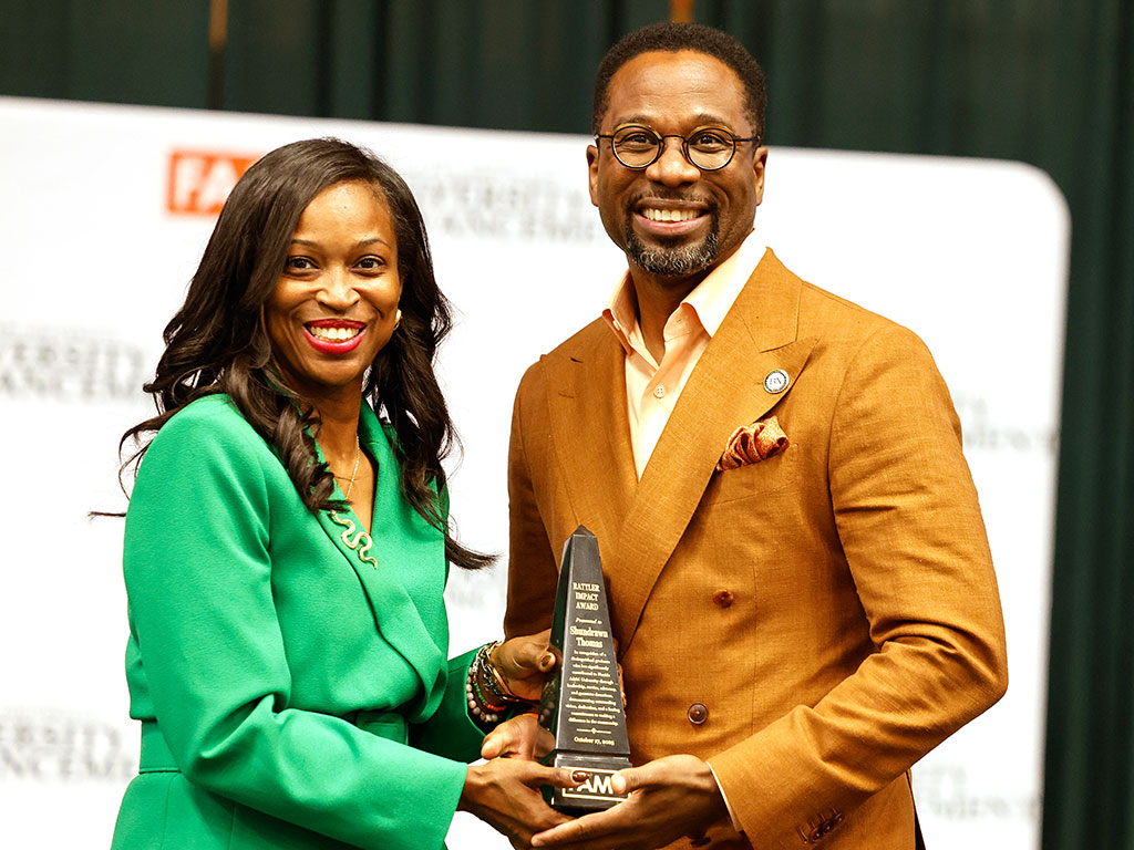 The Rattler Impact Award was presented to Shundrawn Thomas, founder and managing partner of The Copia Group The Rattler Impact Award was presented to Shundrawn Thomas, founder and managing partner of The Copia Group