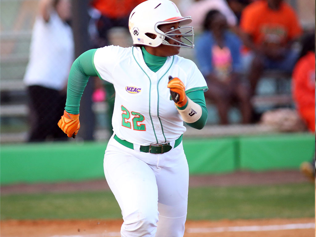 Amber Fullwood running to base. 
