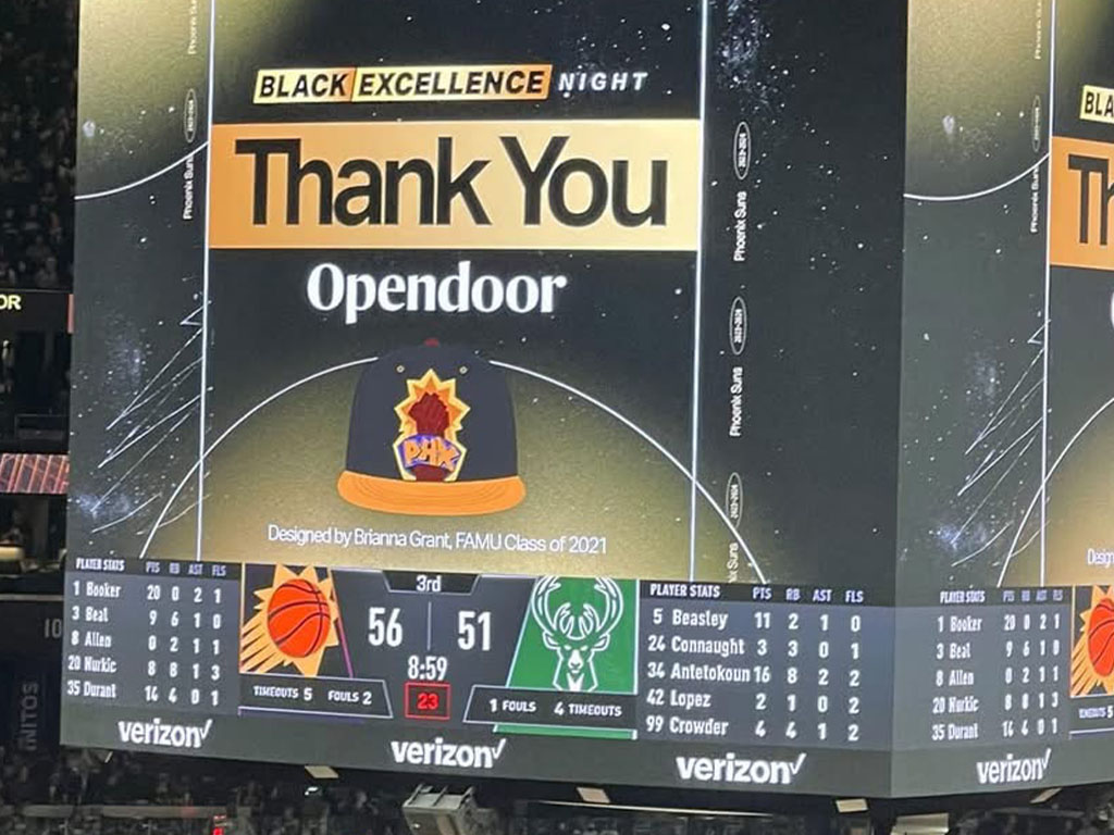 Brianna Grant design on the big screen at a game