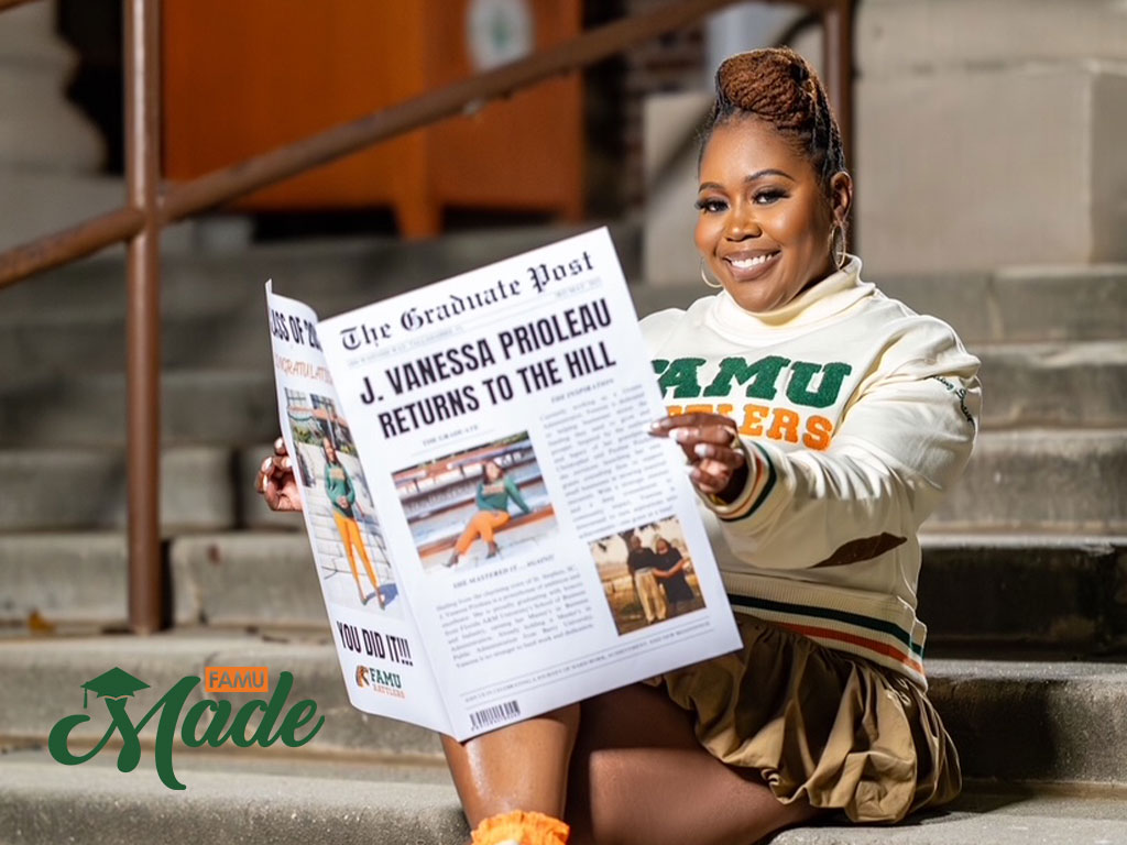 Jacquelyn Vanessa Prioleau reading The Graduate Post with Her Name in the Headline