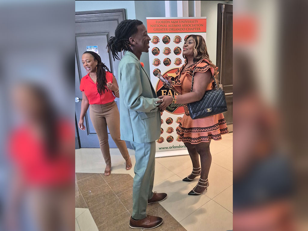 Jayden “JB” Patterson connects with members of the FAMU National Alumni Association Greater Orlando Chapter following his graduation from Florida A&M University.(Photo courtesy of Jayden Patterson)