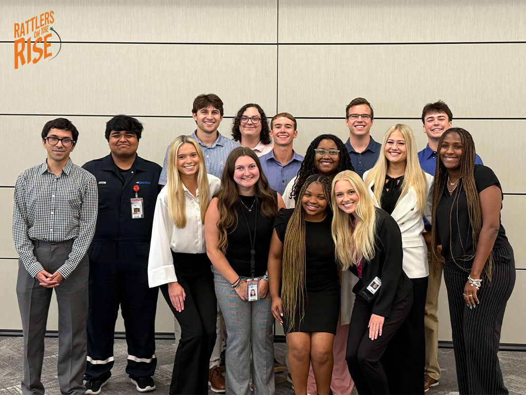Smith takes a group photo with her intern group