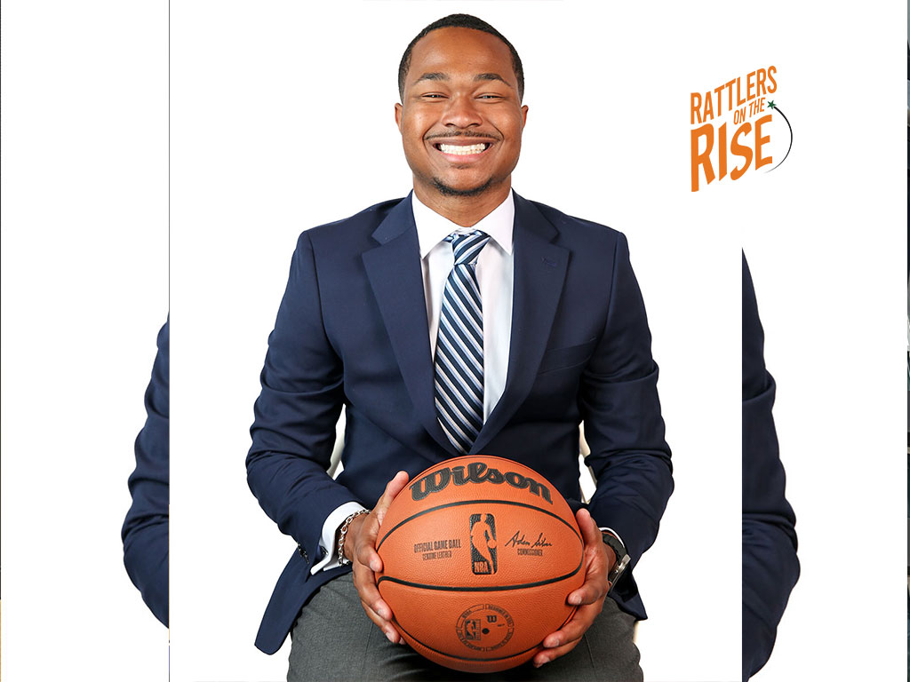 Jeffery Hood Jr. poses with NBA basketball