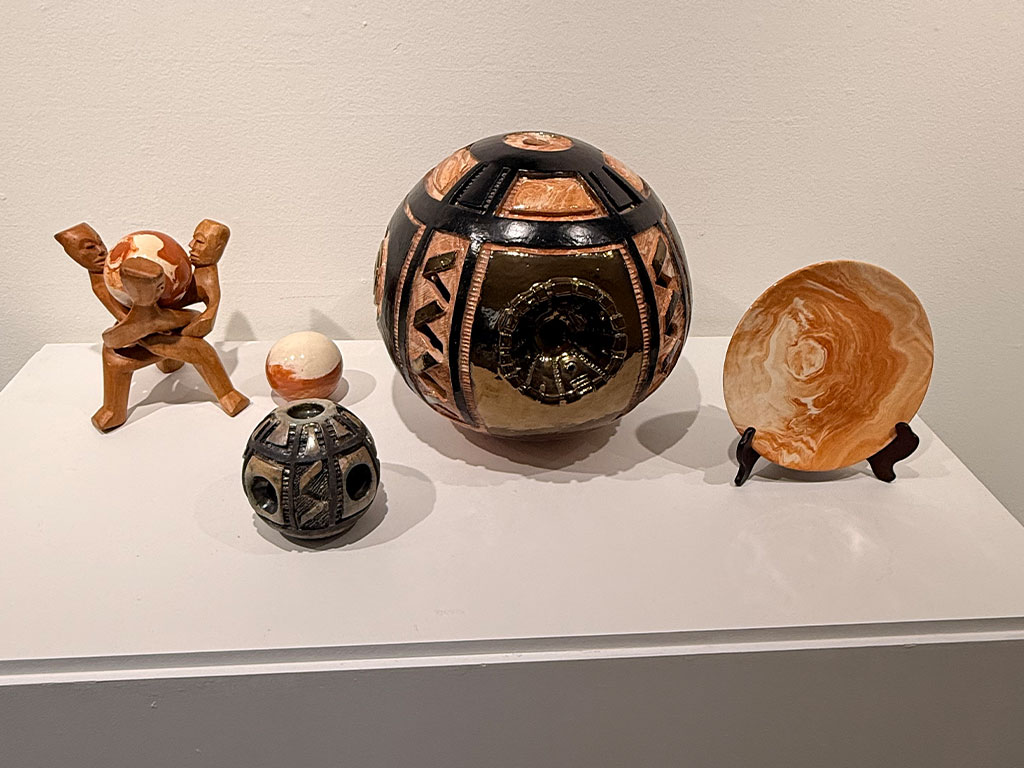 A selection of Marilyn Proctor-Givens’ ceramic works highlights her use of sculptural forms, detailed patterns and varied textures throughout the “Exploration of a Process” exhibition at FAMU’s Foster-Tanner Fine Arts Gallery. (Photo courtesy of Taylor Brooklyn-Cook)