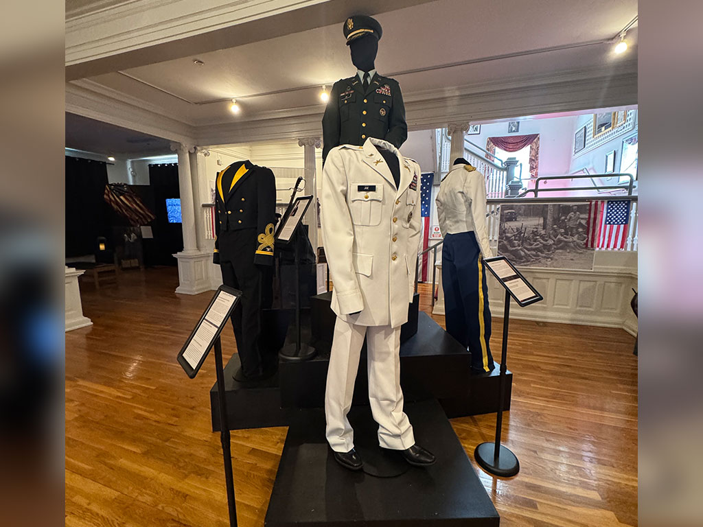Military dress uniforms donated by FAMU alumnus Joe are featured in the Meek-Eaton Black Archives exhibit, highlighting the legacy of African American service and leadership during Black History Month.