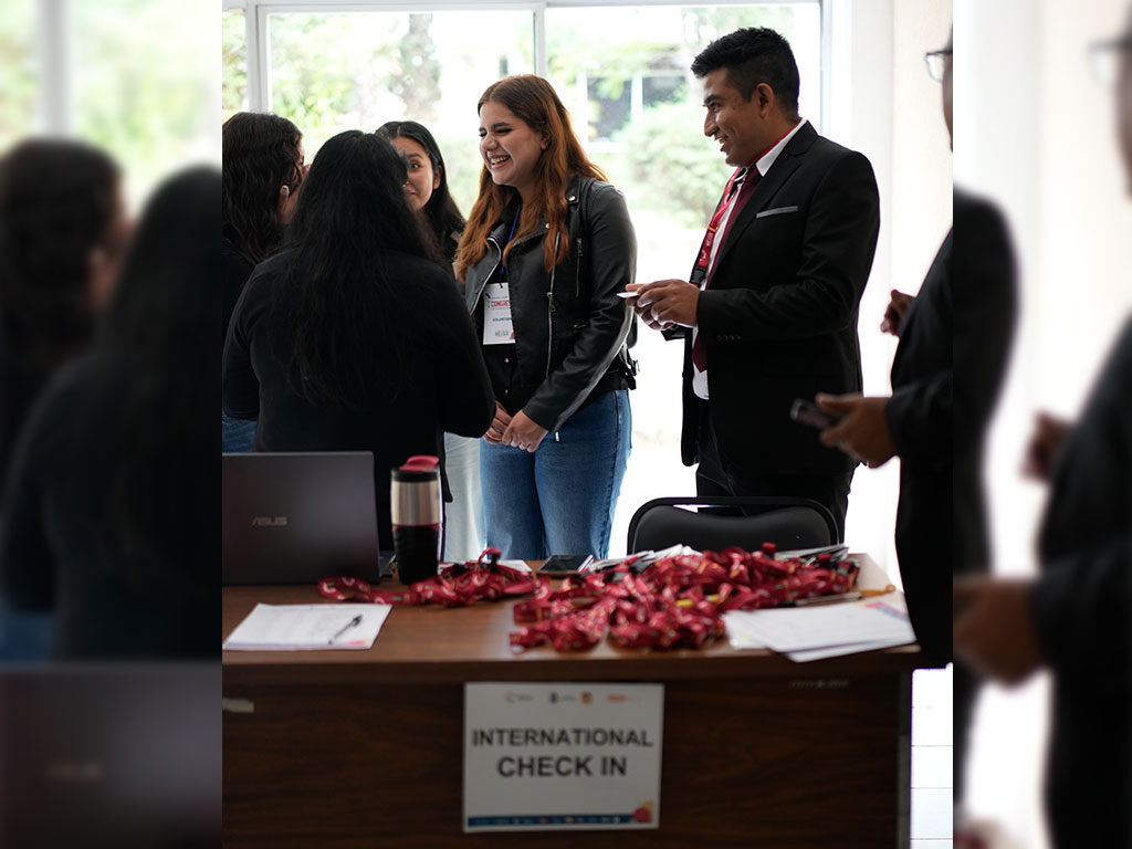 International guests connect during check-in at the 2026 EnergyWaterFoodClimateNexus International Summit in Ciudad Hidalgo, Michoacán, Mexico, marking the start of three days of cross-cultural exchange and collaboration.
