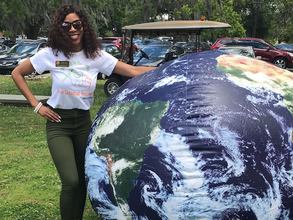 Michelle Fredrick poses during a Florida A&M University campus event, where her passion for health care and community service first began to take shape. That early foundation helped lead her to pursue and earn her Doctor of Public Health degree in Spring 2026. (Photo Courtesy: Michelle Fredrick)