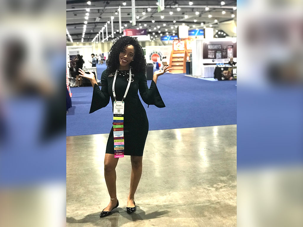 Michelle Fredrick attends a public health conference while pursuing her Doctor of Public Health degree at Florida A&M University. Her passion for research and service helped shape her journey in public health. (Photo Courtesy: Michelle Fredrick)