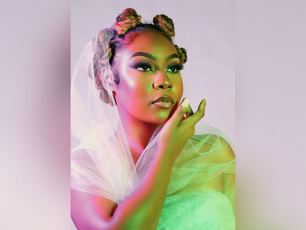 Nailah wrapped in light, crowned in confidence as she dozes off into her bright future.