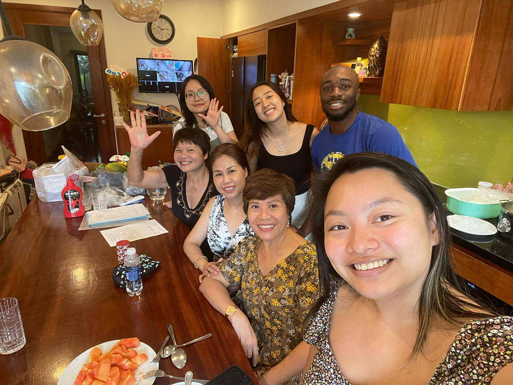 Ashley Saddler and members of his host family in Vietnam