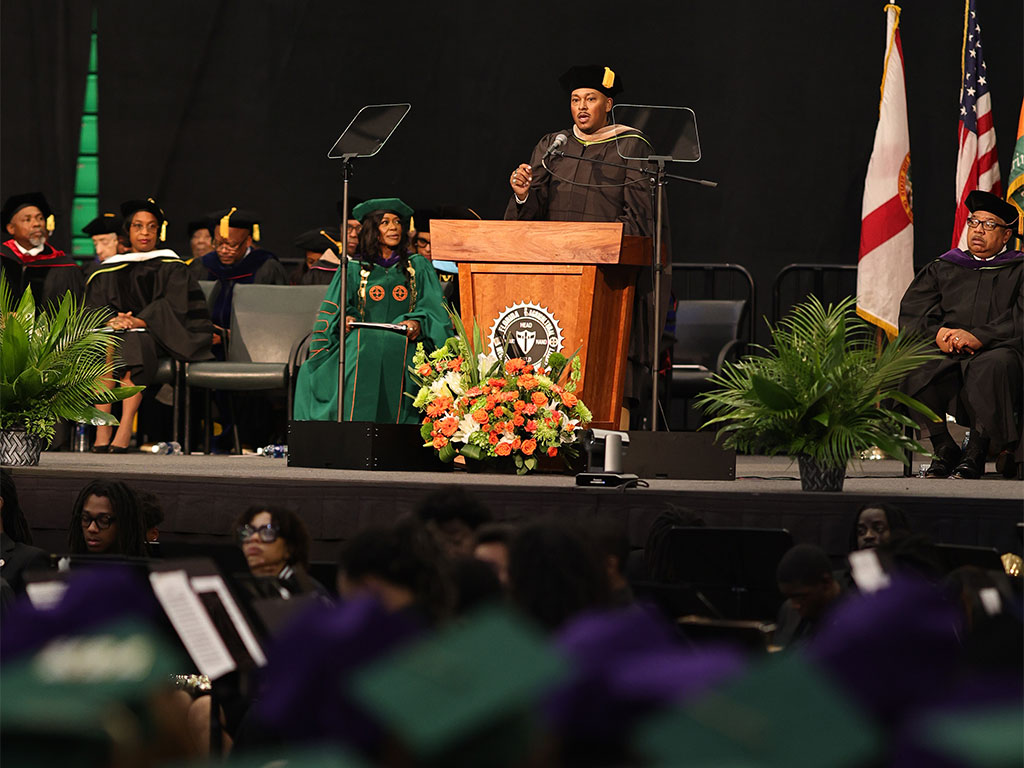Omar Goff delivering commencement address.