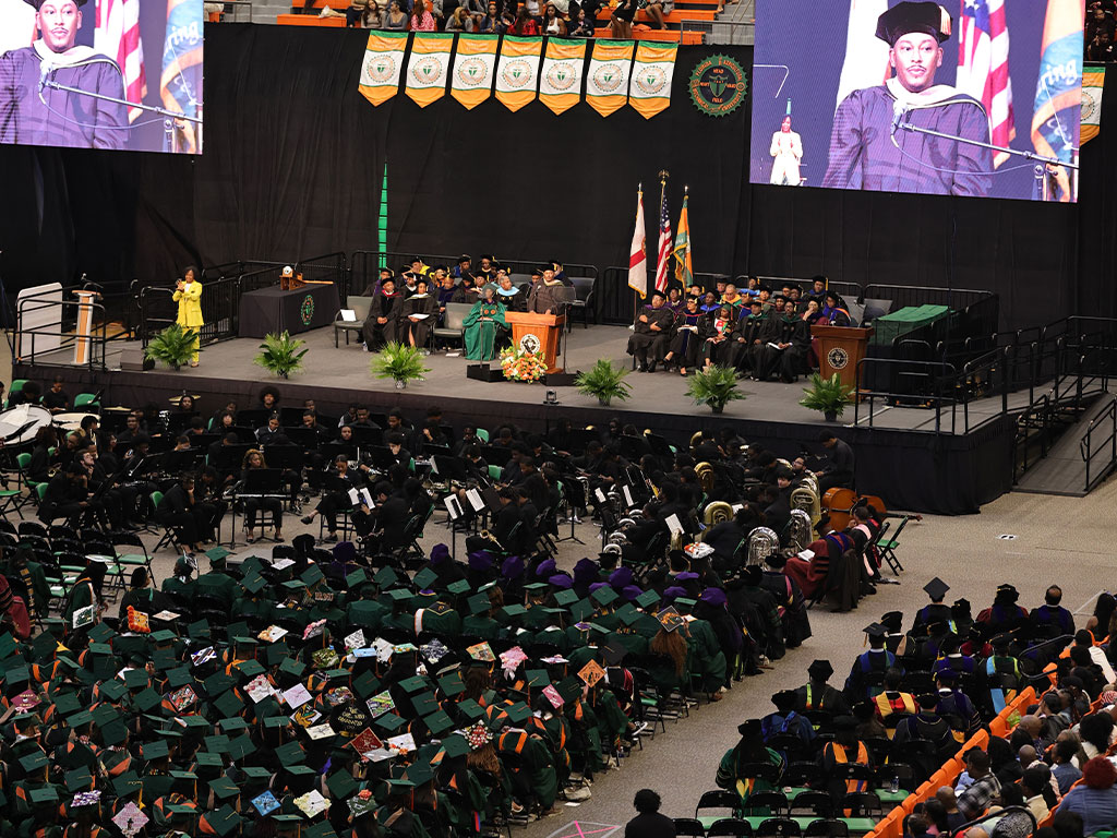 Aeriel shot of Omar Goff giving commencement address.