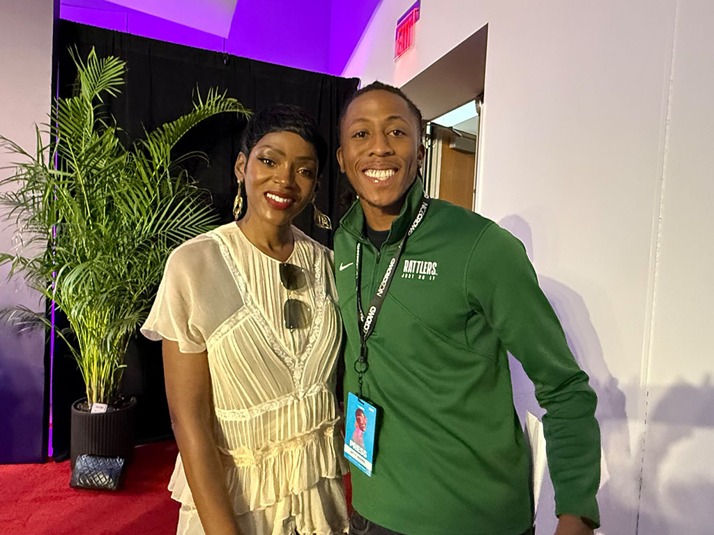 Florida A&M University graphic design student Treyvon Eugene poses with POWER Book II: Ghost actress Caroline Chikezie at the 2025 American Black Film Festival. (Credit: Cassandra Illidge)